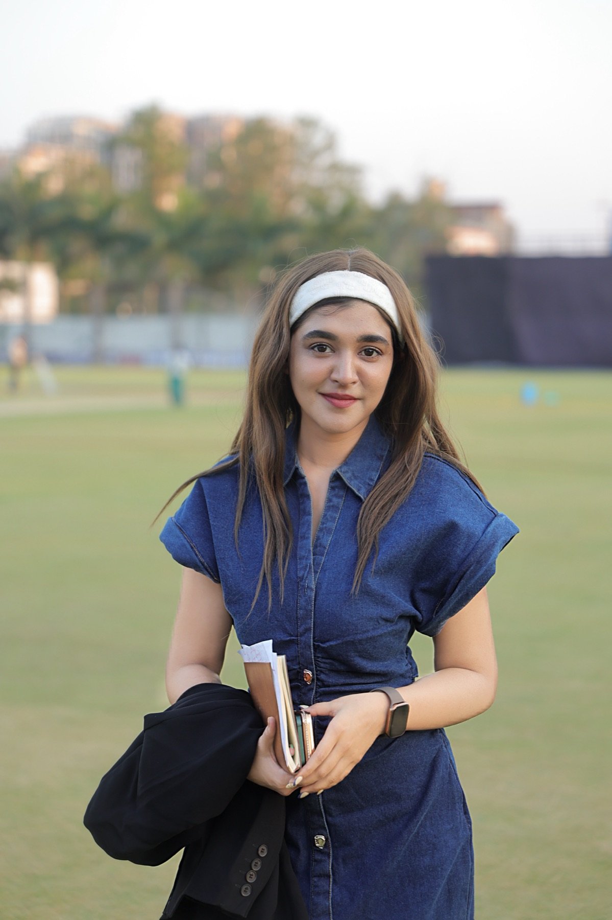 Portrait of Khushi Ansari pitch-side